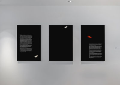 three panels in an exhibition